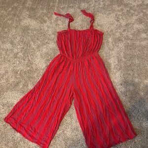 Red Sleeveless Jumpsuit by Maurice’s.  Size Large